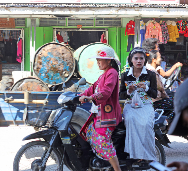 Burmese woman, bike