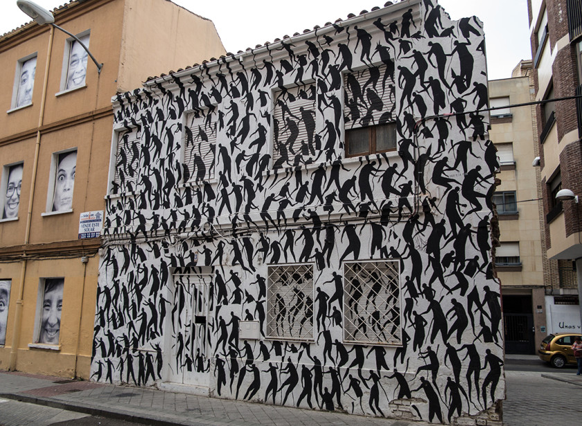 Street art across building in Salamanca, Spain