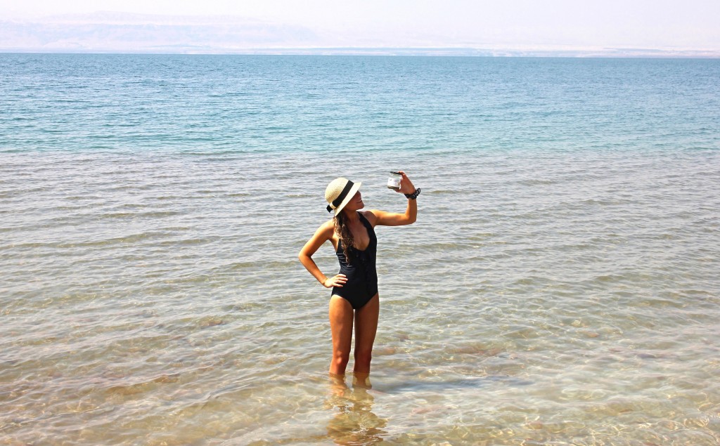 collecting salt water from the Dead Sea, Jordan, mud, floating in the dead sea