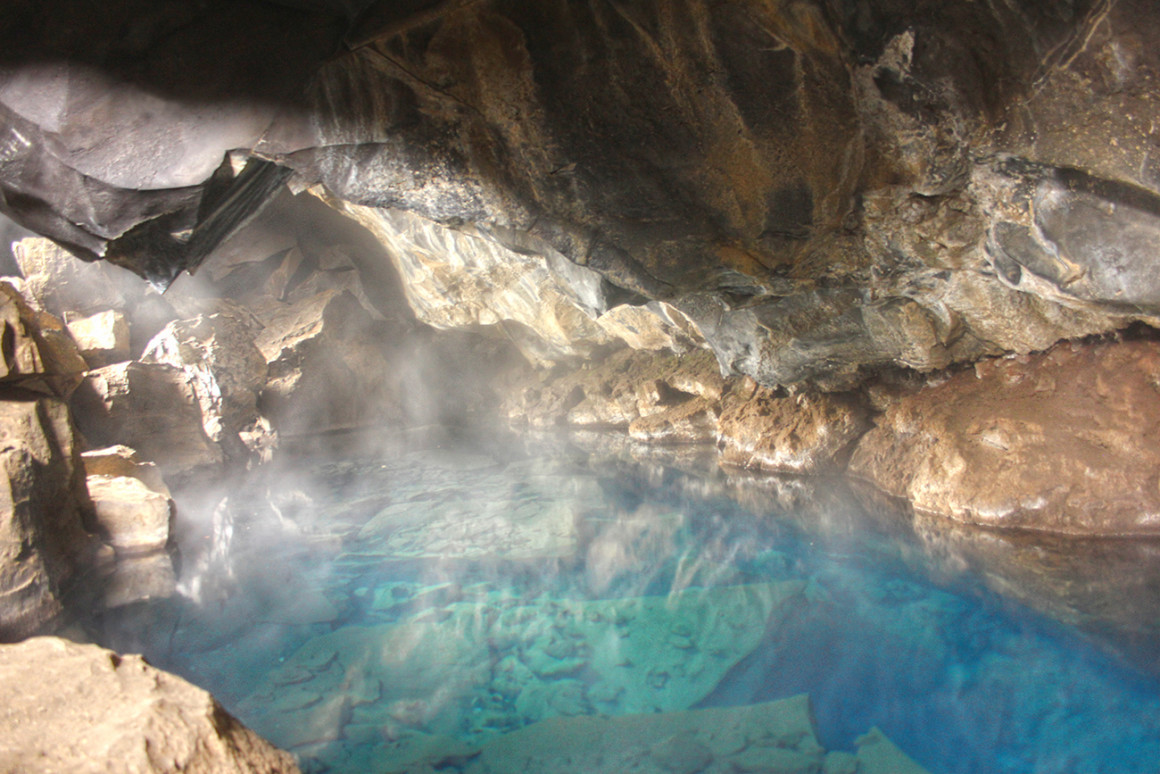 Inside Grjotagja lava cave, North Iceland