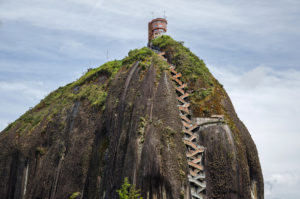 Climbing the Rock of Guatape (El Penol) and how to get there from Medellin.